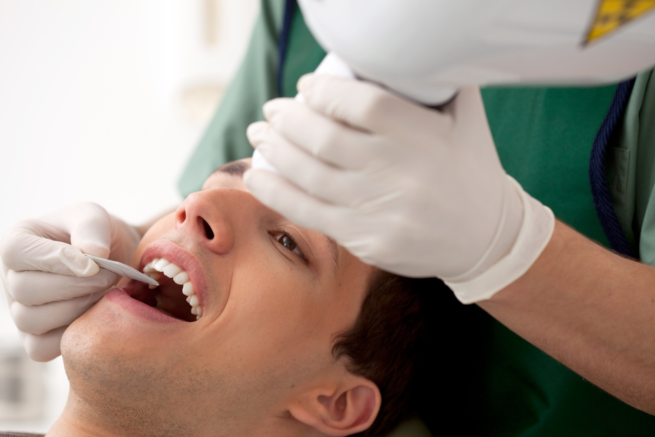 Dentist Preparing X-Ray