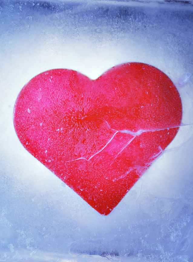 A Red heart frozen in a block of ice